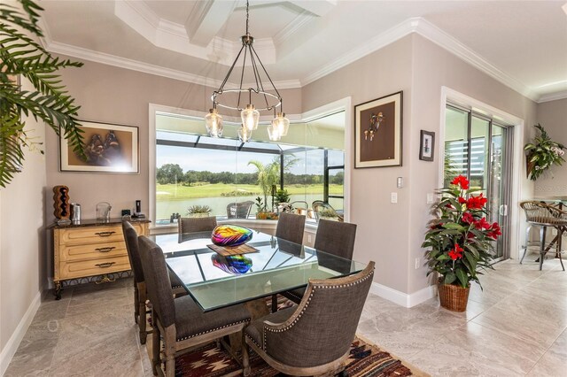 tiled dining room with a wealth of natural light, a tray ceiling, crown molding, and a chandelier