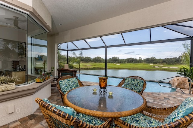 sunroom with a water view