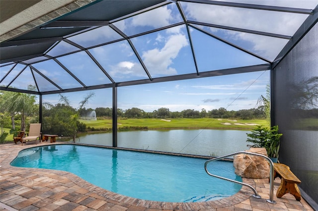 outdoor pool featuring a lanai, a water view, and a patio
