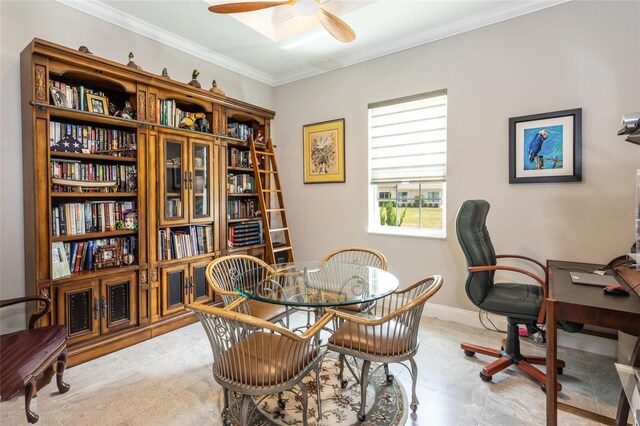 office space featuring ceiling fan, crown molding, and light tile patterned floors