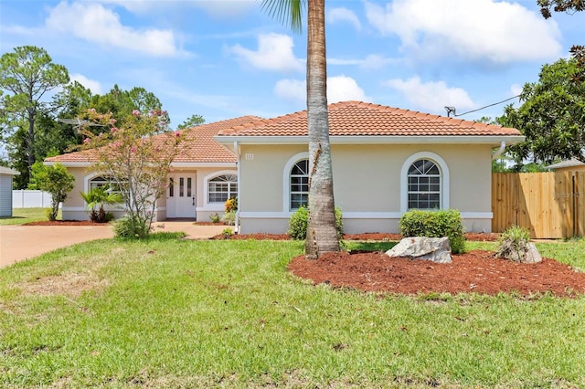 back of house with a yard