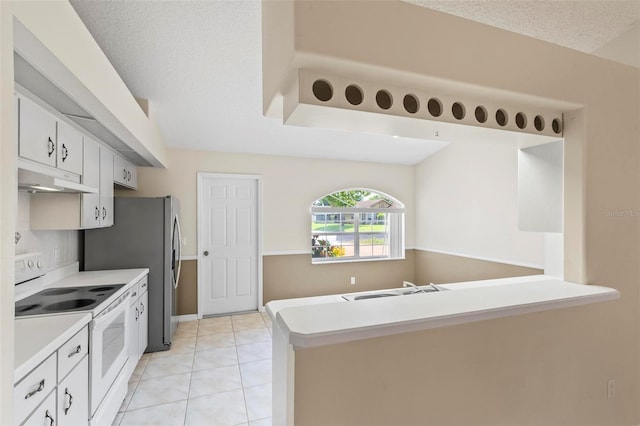 kitchen featuring white range with electric stovetop, white cabinetry, sink, a textured ceiling, and light tile patterned flooring