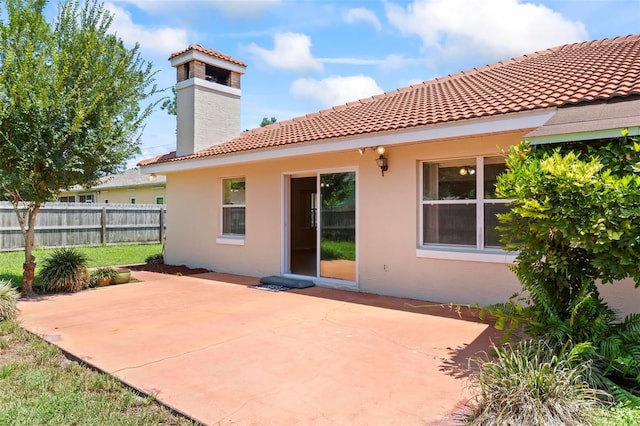 rear view of property with a patio