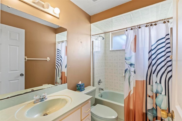 full bathroom with vanity, shower / bathtub combination with curtain, and toilet