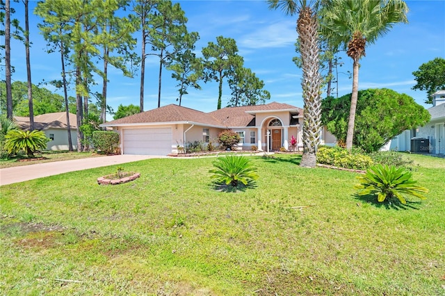 view of front of house featuring a garage, central AC unit, and a front lawn