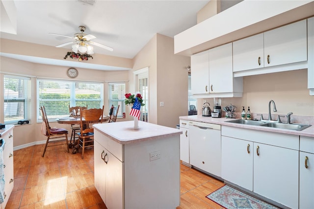 kitchen featuring ceiling fan, dishwasher, plenty of natural light, and sink