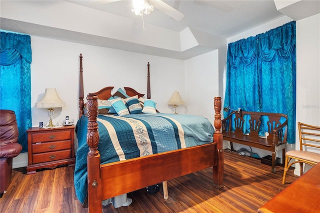 bedroom featuring ceiling fan and dark hardwood / wood-style flooring