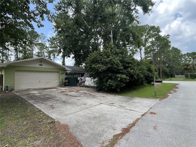 view of home's exterior featuring a garage