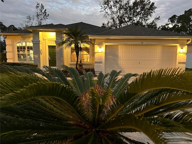 view of front of home featuring a garage