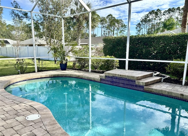 view of pool featuring a lanai