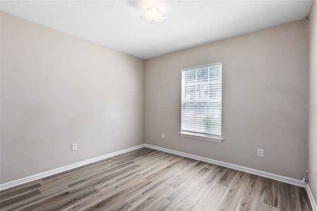 empty room featuring light hardwood / wood-style floors