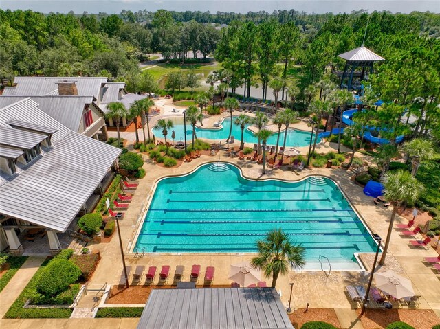 view of pool featuring a patio area