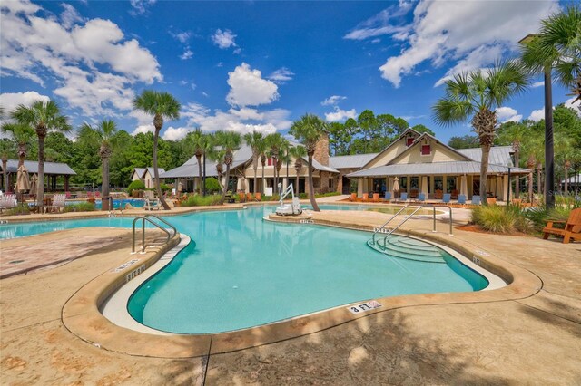 view of pool with a patio area