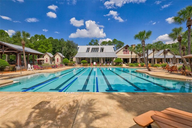 view of swimming pool with a patio area