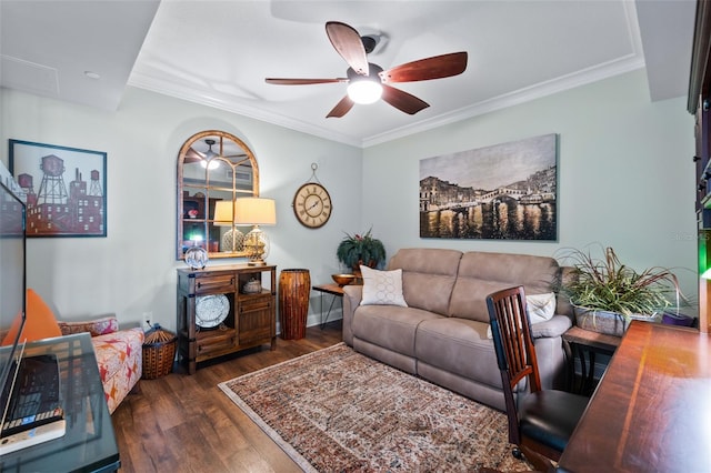 living room featuring ceiling fan, crown molding, and dark hardwood / wood-style flooring