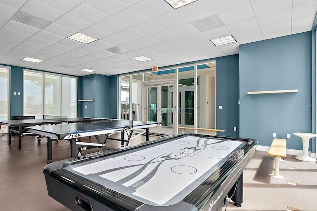 playroom with expansive windows and french doors