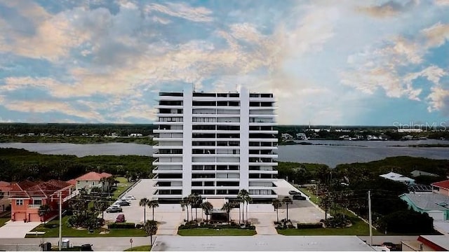 view of building exterior with a water view