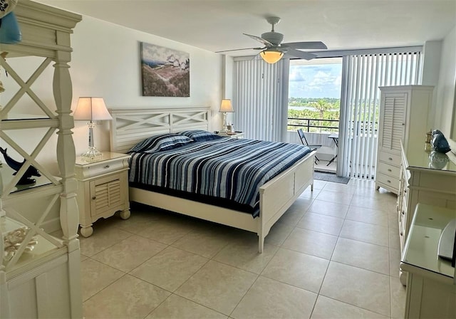 bedroom featuring access to exterior, ceiling fan, light tile patterned floors, and floor to ceiling windows