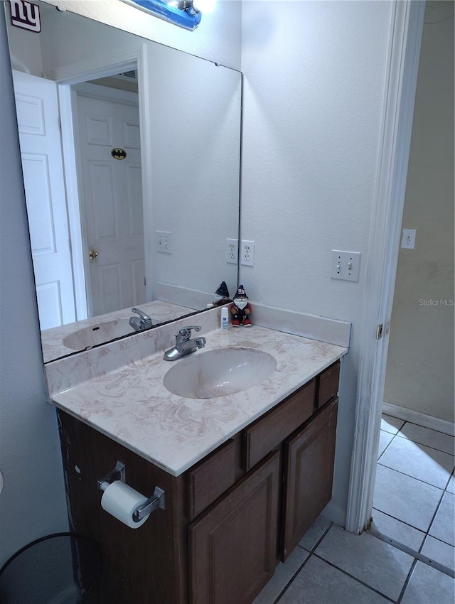 bathroom featuring vanity and tile patterned floors