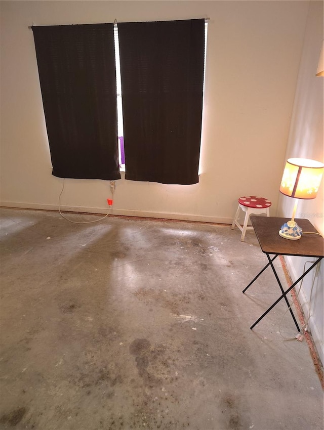 empty room featuring concrete floors