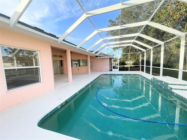 23 Flemington Ln, Palm Coast, FL 32137 - outdoor pool featuring a patio area, ceiling fan, and a lanai