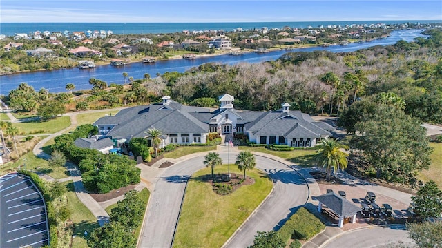 birds eye view of property featuring a water view