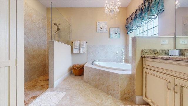 full bathroom with a chandelier, tile patterned flooring, a garden tub, vanity, and walk in shower