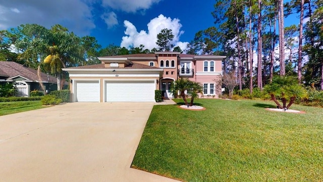 view of front facade featuring driveway, a garage, a balcony, a front lawn, and stucco siding