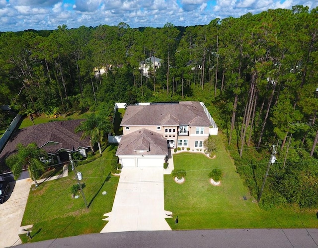 aerial view featuring a view of trees