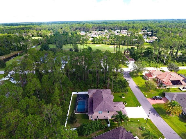 bird's eye view featuring a forest view