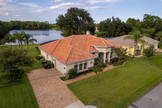 bird's eye view with a water view