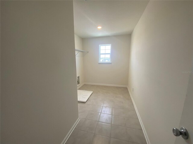 walk in closet featuring light tile patterned floors