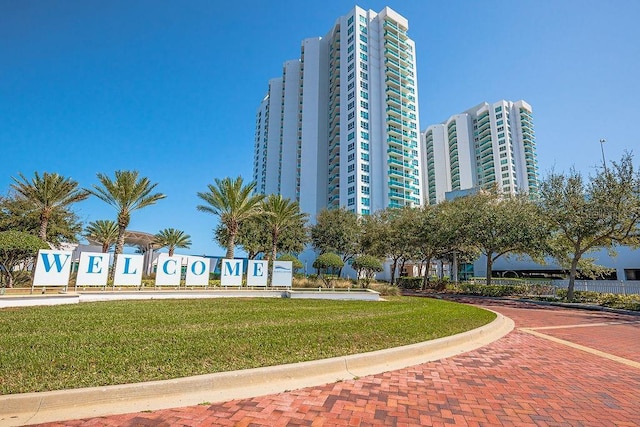 view of community featuring a yard