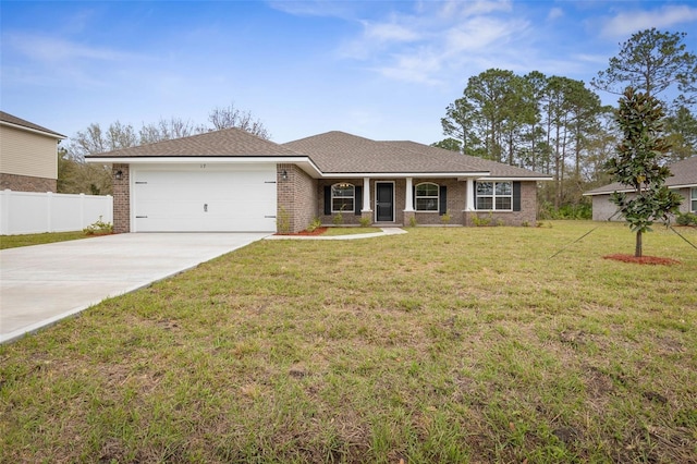 ranch-style home with brick siding, driveway, a garage, and fence