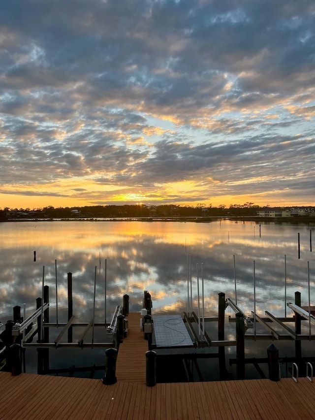 view of dock featuring a water view and boat lift