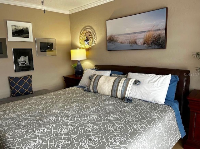 bedroom featuring crown molding