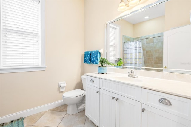 full bath with toilet, a shower with shower curtain, vanity, baseboards, and tile patterned floors