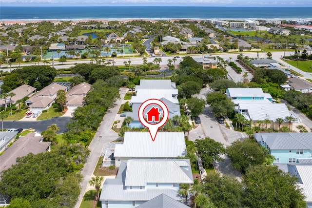 aerial view featuring a water view and a residential view