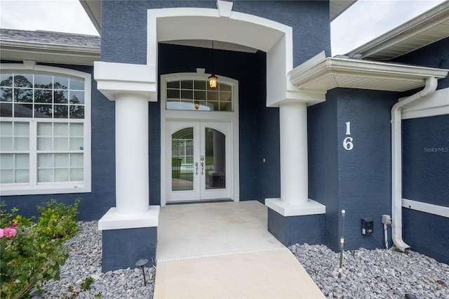 doorway to property featuring french doors