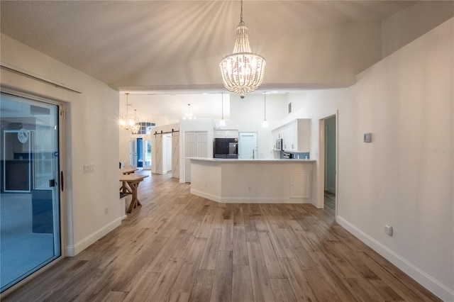 welcome area with an inviting chandelier