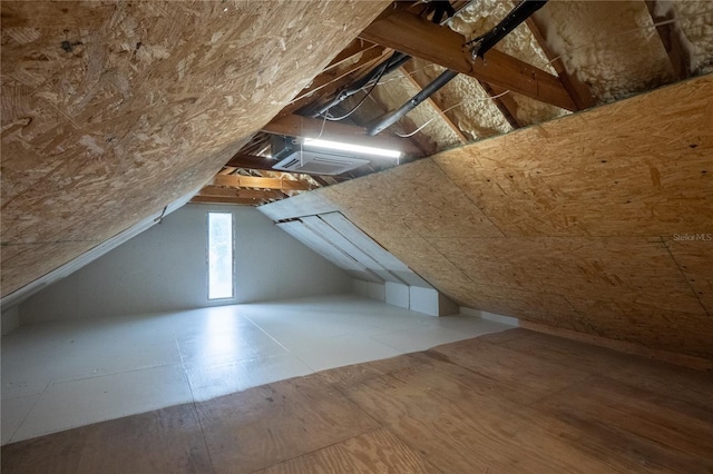 bonus room featuring lofted ceiling