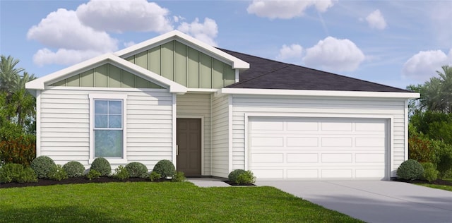 view of front of house with a front lawn and a garage