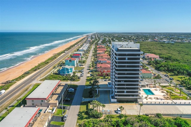 aerial view with a view of the beach and a water view