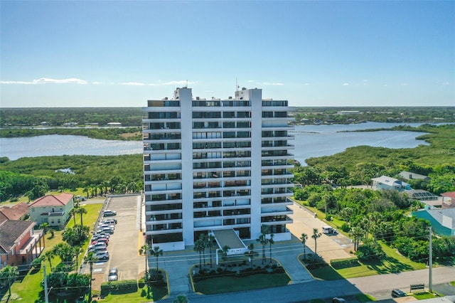 view of building exterior featuring a water view