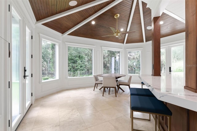 dining space featuring wood ceiling, vaulted ceiling, ceiling fan, and french doors