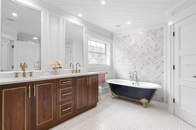 bathroom with a tub to relax in, tile walls, and vanity