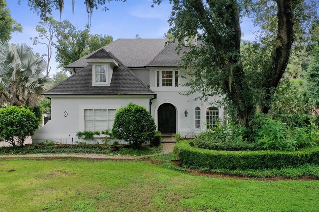 view of front of home with a front yard