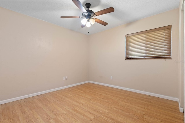 unfurnished room with light wood-type flooring, ceiling fan, and a textured ceiling