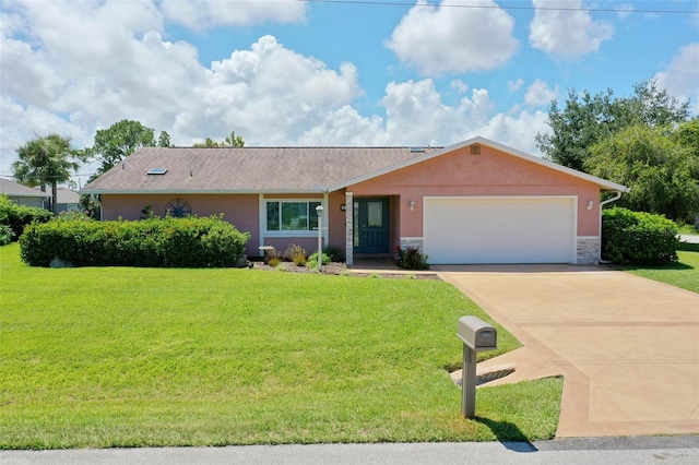 ranch-style house featuring a front yard and a garage