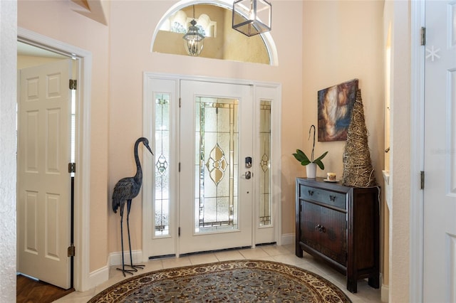 foyer featuring light tile patterned flooring